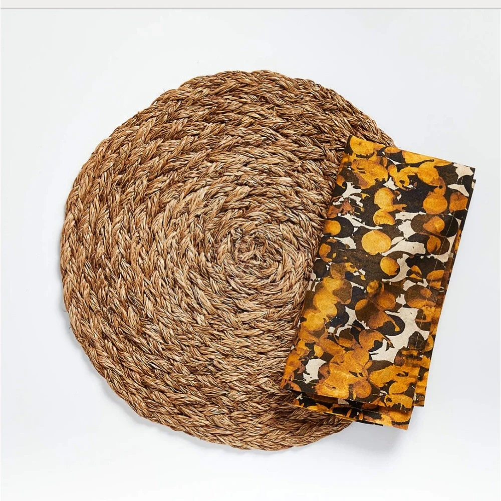 NWOT BALI ROUND WOVEN PLACEMAT- Crate & Barrel